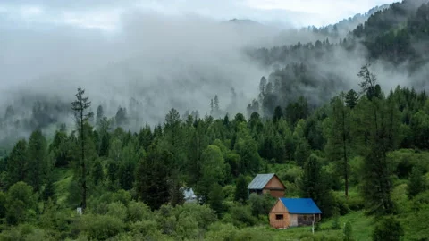 Timelapse of Clouds passing over houses in Altai mountains, Kazakhstan Stock Footage 147180028