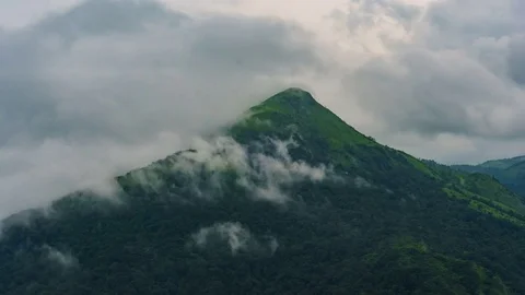 Timelapse Of Clouds Passing Over Tropical Mountains 動画素材 79420187