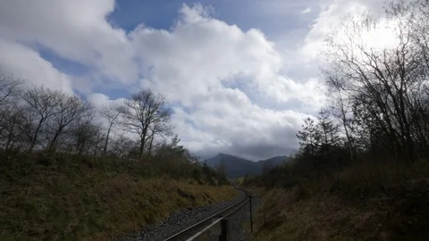 Timelapse of clouds with railway at Snowdonia, Wales. 4K Stock Footage 86603653