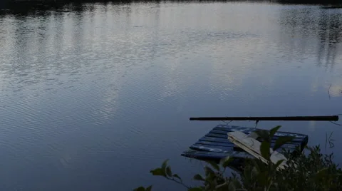 Timelapse of clouds reflecting on a lake in Canada 스톡 동영상 68933623