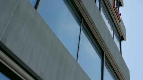 Timelapse of clouds reflecting in a skyscarper Stock Footage 64554227