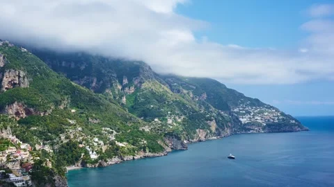 Timelapse of clouds rolling above the coastline of Positano, Italy. Stock Footage 241527682