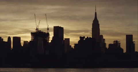 Timelapse of clouds rolling behind the Empire State Building Stock Footage 51224198