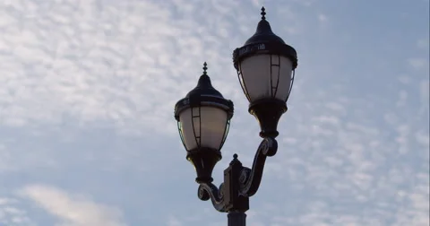 Timelapse of clouds rolling behind a Lamp Post Stock Footage 51223010