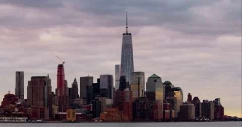 Timelapse of clouds rolling behind One World Trade Center in the downtown Stock Footage 51223155