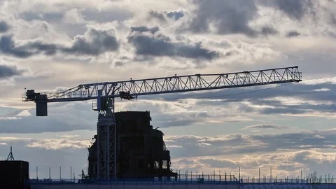 Timelapse of clouds rolling over a crane Stock Footage 78561040
