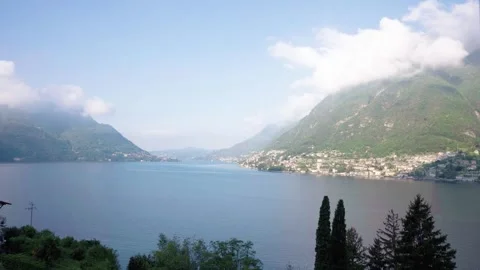 Timelapse: Clouds Rolling Over Lake Como as Boats Glide Across its Waters Stock Footage 265587685