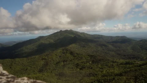 Timelapse of clouds rolling over a mountain in Puerto Rico Stock Footage 331654533