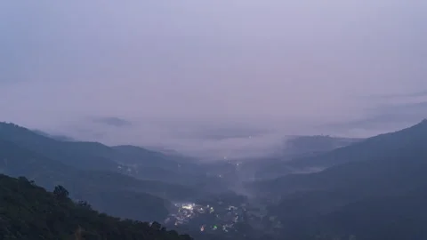 Timelapse - Clouds rolling in a valley 4K30 Stock Footage 270358451