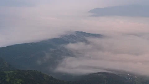 Timelapse - Clouds rolling in a valley 4K30 Stock Footage 270358729