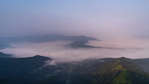 Timelapse - Clouds rolling in a valley 4K30 Stock Footage 270358846