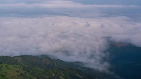 Timelapse - Clouds rolling in a valley 4K30 Stock Footage 271195273