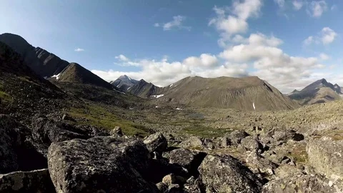 TimeLapse. Clouds running in the sky. Mountain landscape Stockbeeldmateriaal 93986990