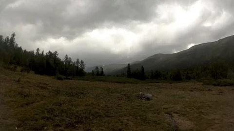 TimeLapse. Clouds running in the sky. Mountain landscape Stock Footage 93987022