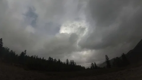 TimeLapse. Clouds running in the sky. Mountain landscape Stockbeeldmateriaal 93987026