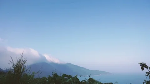 Timelapse of clouds shadow over mountain forest and sea. Stock Footage 74820552