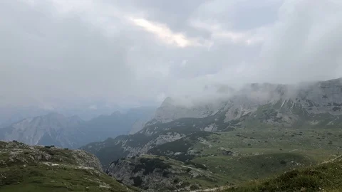 Timelapse with clouds shot in the Dolomites mountains in Italy Stock Footage 114984730