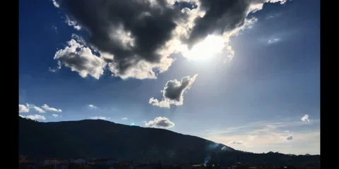 Timelapse of clouds with sun behind in Lousã Village Stock-Footage 333836326