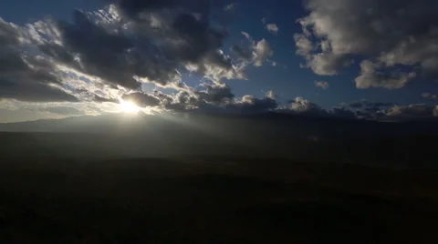 Timelapse Clouds sun peaking through Stock Footage 35334223
