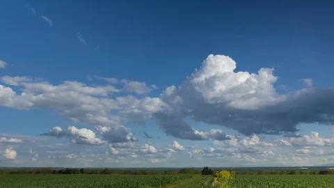 Timelapse of clouds on a sunny day in Freising, Bavaria 4k Stock Footage 94957319