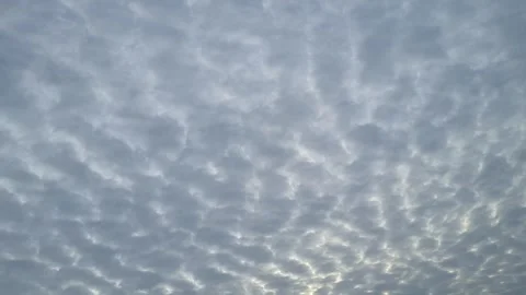 Timelapse clouds with sunrise rays breaking through Video stock 315012036