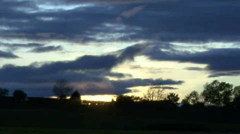 Timelapse clouds at sunset Stock Footage