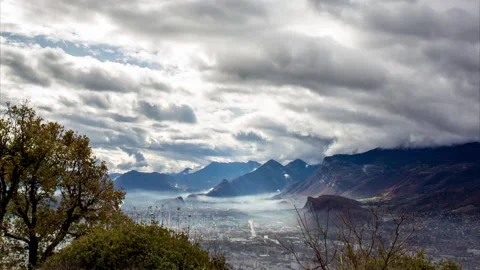 Timelapse of clouds in the valley - Autumn in the mountains Stock Footage 165683481