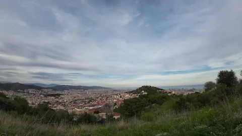 Timelapse of clouds with a view of the city and mountains Stock Footage 271097476