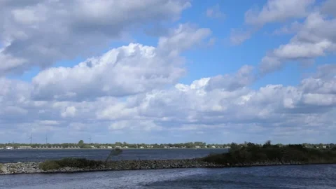 Timelapse clouds windmills water Stock Footage 143647807