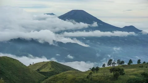 Timelapse of cloudscape over Mount Sindoro Stock Footage 61910410