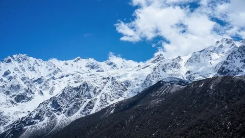 Timelapse of cloudscape over snowy mountain in Langtang Valley, Nepal Stock Footage 89164941