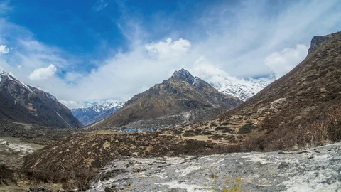 Timelapse of cloudscape over snowy mountain in Langtang Valley, Nepal Stock Footage 90237451