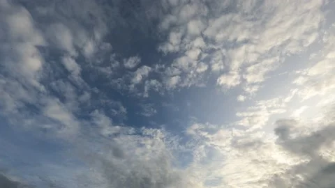 Timelapse cloudscape transparent white in clouds blue sky Stock Footage 203785571
