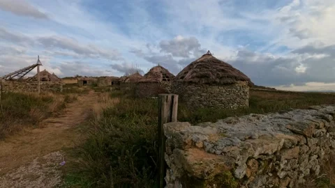 Timelapse on a cloudy day of ancient Celtic dwellings at the Castromao fort in Stock Footage 171219109