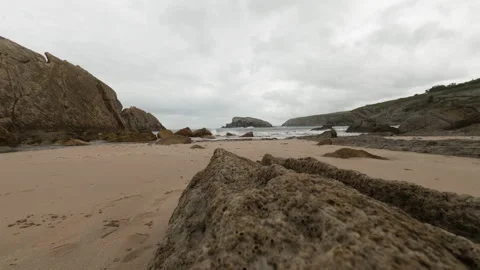 Timelapse cloudy day in a rocky beach in Spain 4K Stock Footage 137710449