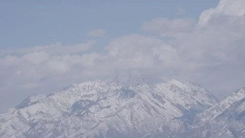 Timelapse of a cloudy day of the Salt Lake Twin Peaks in the Wasatch Mountains Stock-Footage 242458477