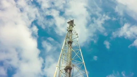 TimeLapse of a cloudy daytime sky with a GSM base station, loop video Stock Footage 76646614