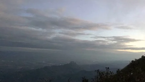 Timelapse Of cloudy flow over the mountain 스톡 동영상 90392906