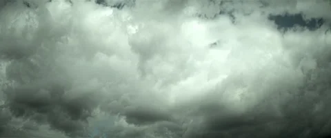 Timelapse of cloudy puffy sky anamorphic Stock Footage 242868014