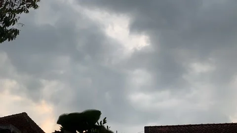 Timelapse cloudy sky, dark dramatic clouds during rain and wind Video stock 284911514