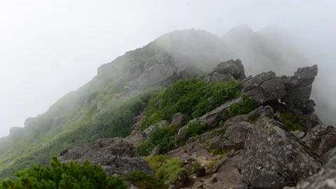 Timelapse Cloudy sky over in mountain Yotei (Yotei Zan) ,Hokkaido, Japan Video stock 110205547