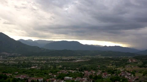 Timelapse Cloudy Sky Sunset to Dusk Slow Zoom Out in Meteora, Greece. Small.. Stock Footage 334897333
