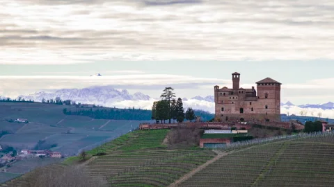 Timelapse in cloudy spring day on Grinzane Cavour vineyard castle in Langa Stock Footage 272895846