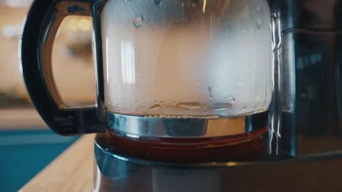 Timelapse of the coffee cup with pouring coffee from the drip coffee maker Stock Footage 340198585