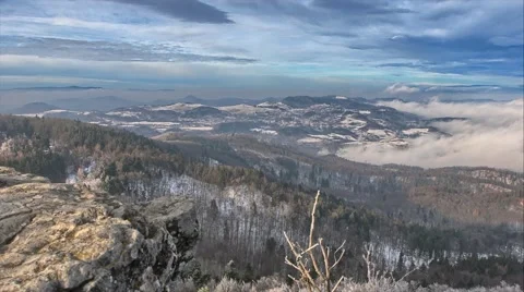 Timelapse of cold winter in Eastern Europe, clouds rolling in the valley. Stock Footage 61793096