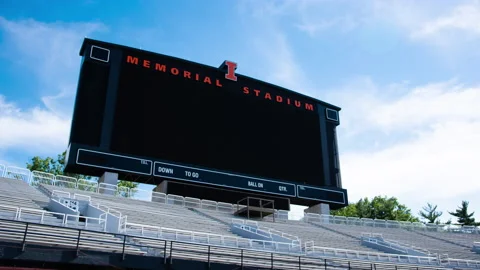 Timelapse of college stadium videoboard jumbotron Stock Footage
