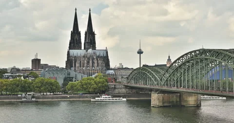 Timelapse of Cologne central cathedral with clouds passing by at river rhine Stock Footage 151867506