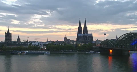 Timelapse of Cologne central cathedral with clouds passing by at river rhine Stock Footage 151868676