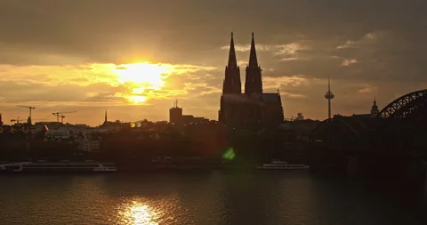 Timelapse of Cologne central cathedral with clouds passing by at river rhine Video stock 151869163
