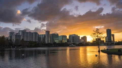 Timelapse of a colorful sunset at Lake Eola and city skyline in Orlando, Florida Stock Footage